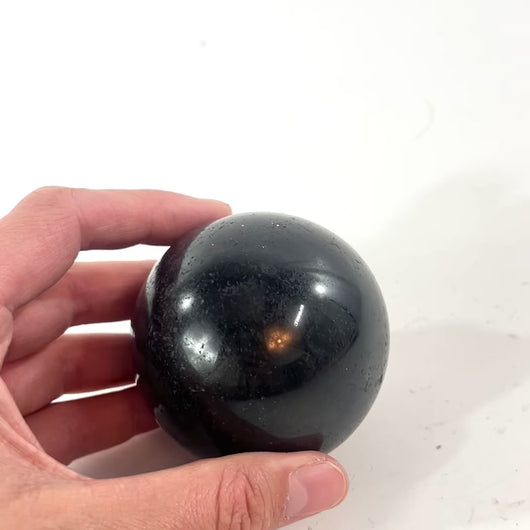 Black tourmaline polished crystal sphere | ASH&STONE Crystal Shop Auckland NZ