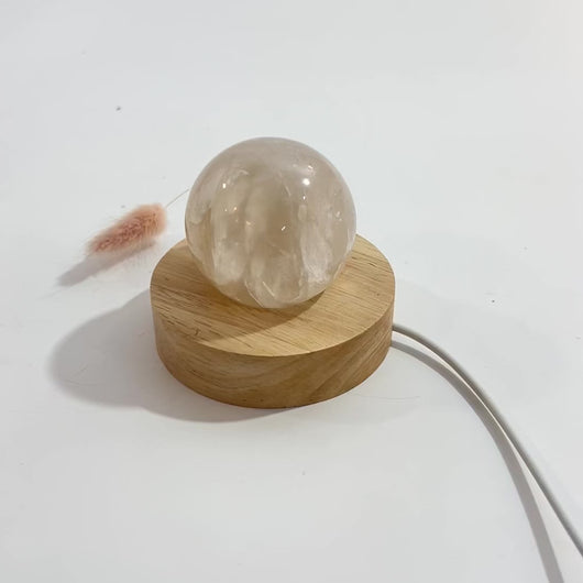 Clear quartz crystal sphere on LED lamp base | ASH&STONE Crystals Shop Auckland NZ