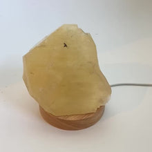 Load and play video in Gallery viewer, Honey calcite crystal lamp on LED wooden base 1.3kg | ASH&amp;STONE Crystals Shop Auckland NZ
