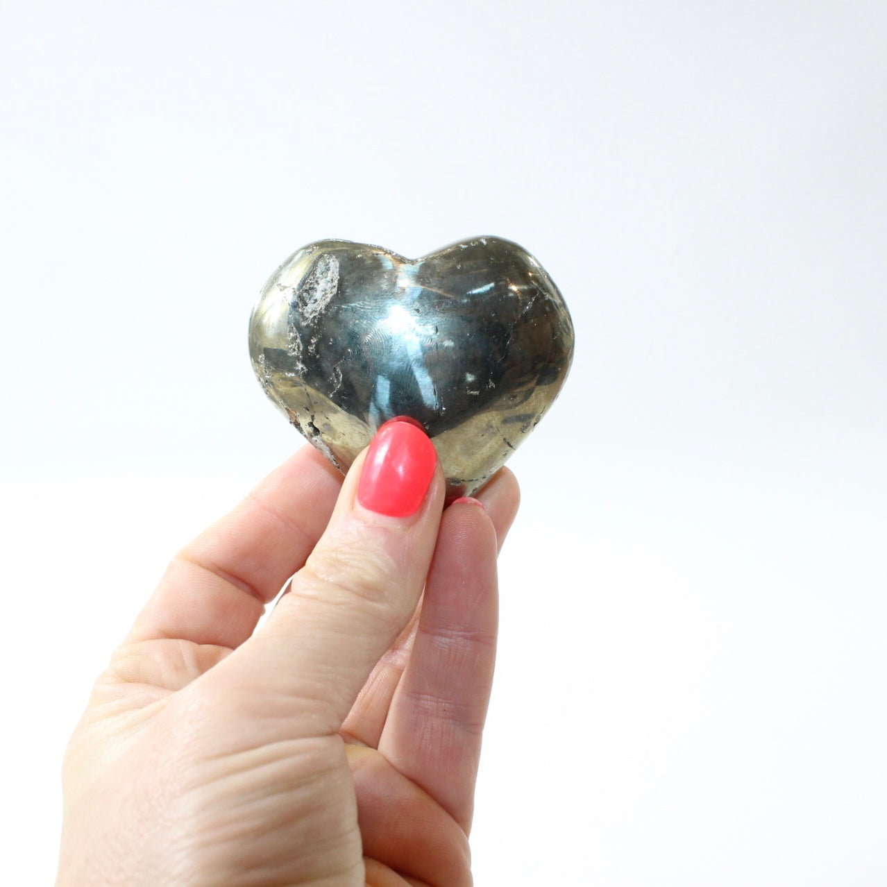 Pyrite Polished Heart. Attract success. Free express shipping. Buy Pyrite crystals online from ASH&STONE Auckland crystal shop. AfterPay available.