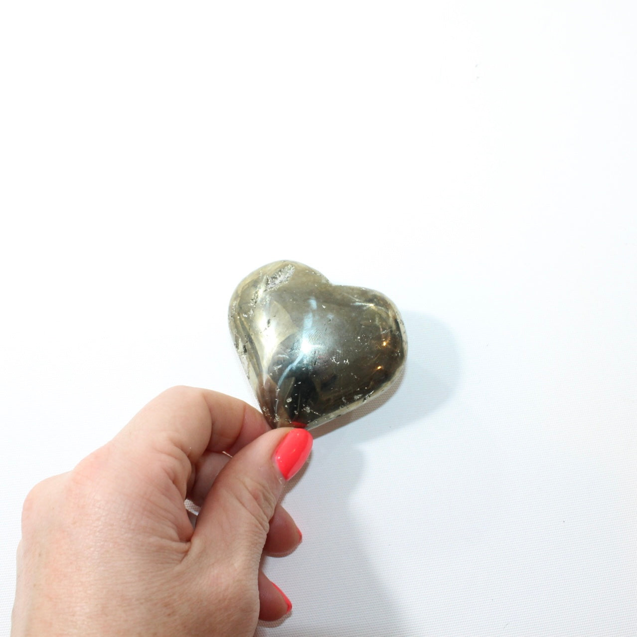 Pyrite Polished Heart. Attract success. Free express shipping. Buy Pyrite crystals online from ASH&STONE Auckland crystal shop. AfterPay available.