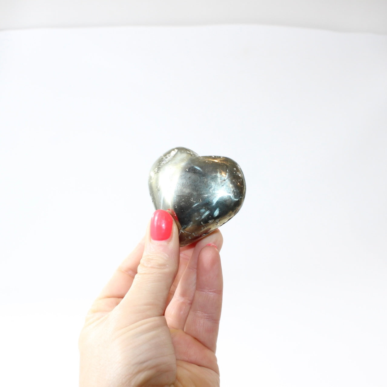 Pyrite Polished Heart. Attract success. Free express shipping. Buy Pyrite crystals online from ASH&STONE Auckland crystal shop. AfterPay available.