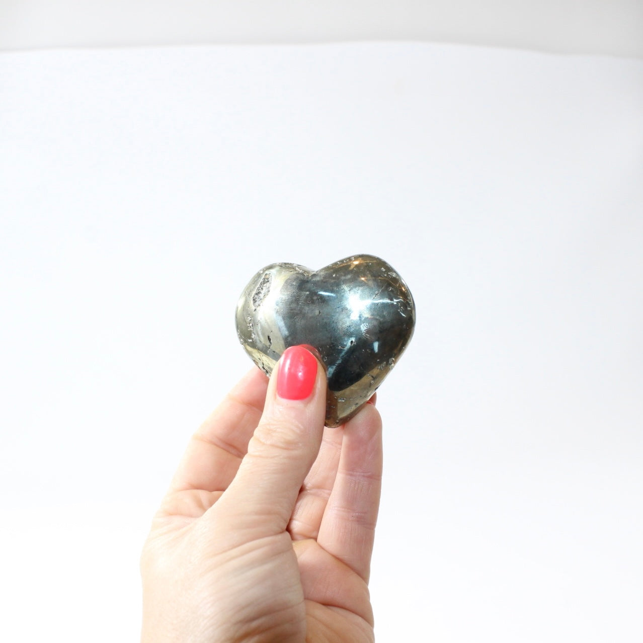 Pyrite Polished Heart. Attract success. Free express shipping. Buy Pyrite crystals online from ASH&STONE Auckland crystal shop. AfterPay available.