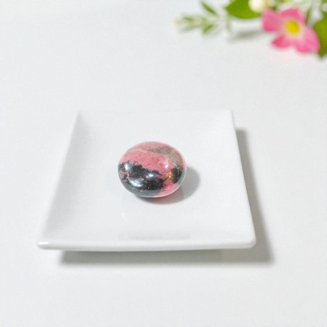 Rhodonite Palm stone | ASH & STONE. Crystals online, free express shipping, NZ.
