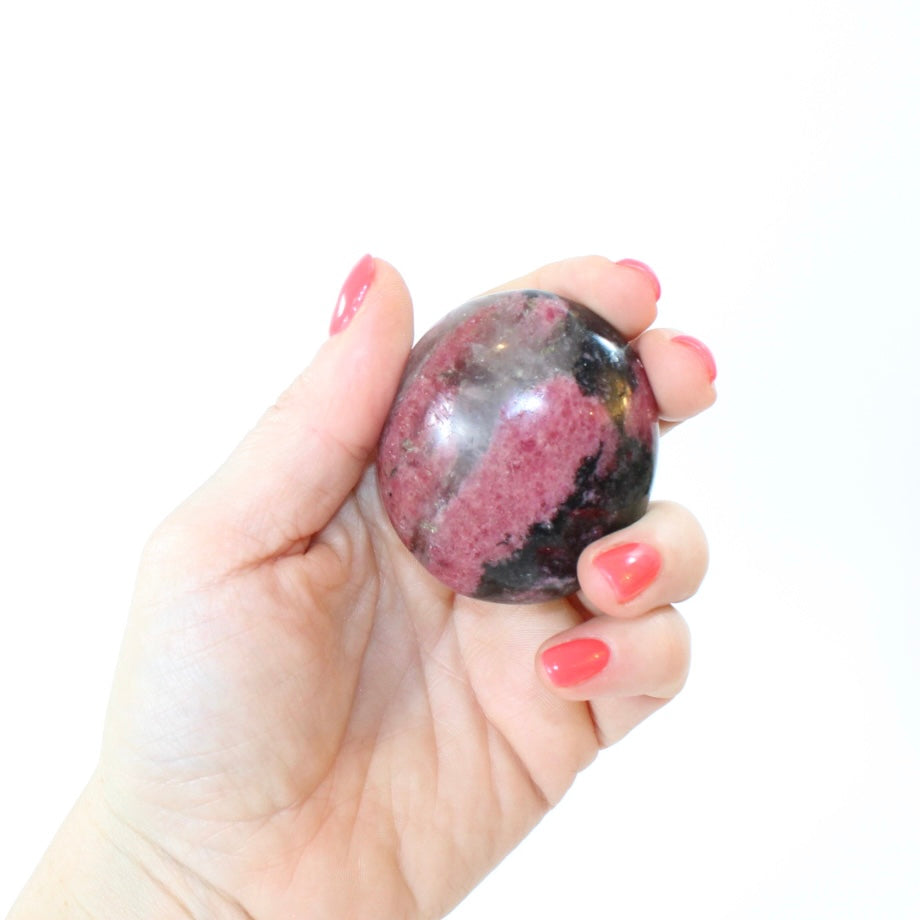 Rhodonite Palm stone | ASH & STONE. Crystals online, free express shipping, NZ.