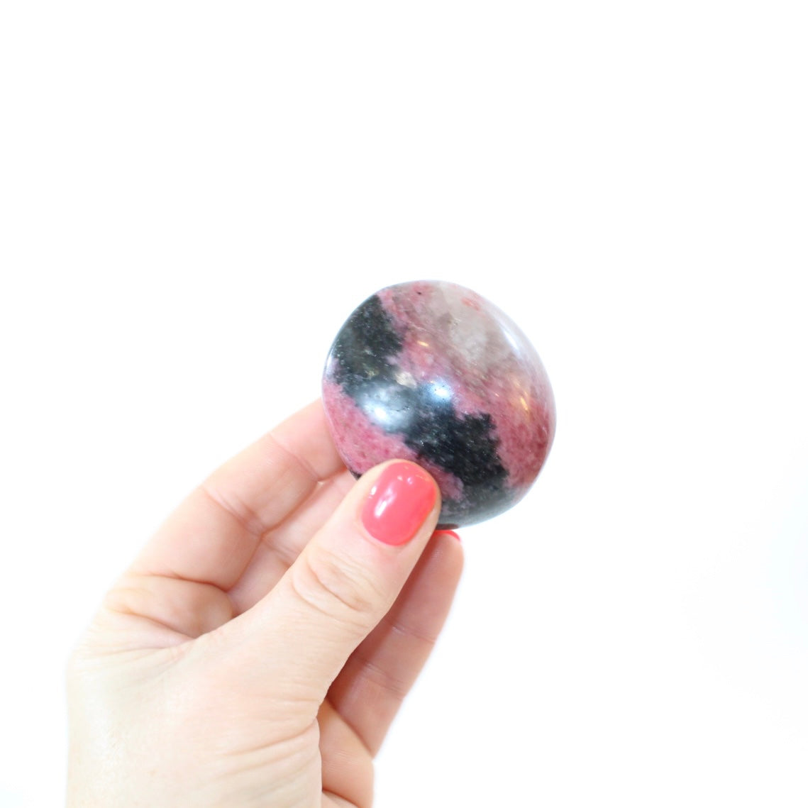 Rhodonite Palm stone | ASH & STONE. Crystals online, free express shipping, NZ.