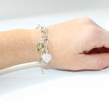 Rose Quartz & Peridot crystal sterling silver charm bracelet. Free express shipping. Shop online from ASH&STONE crystal jewellery shop Auckland NZ. 