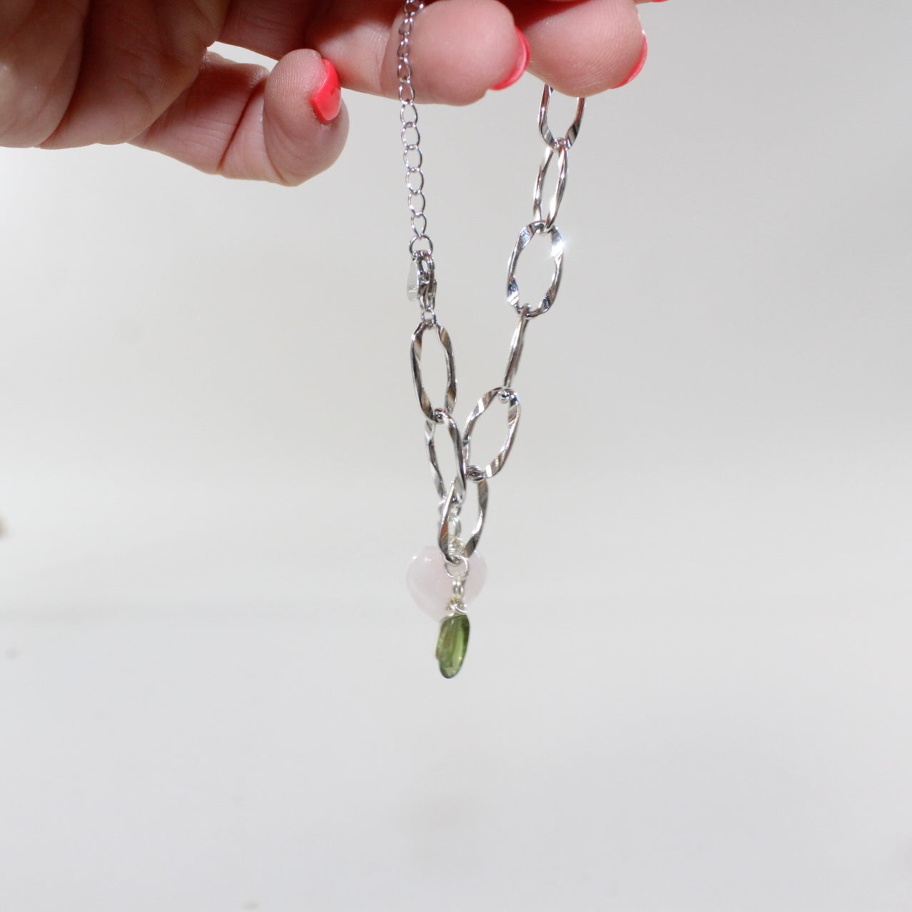 Rose Quartz & Peridot crystal sterling silver charm bracelet. Free express shipping. Shop online from ASH&STONE crystal jewellery shop Auckland NZ. 