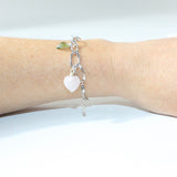 Rose Quartz & Peridot crystal sterling silver charm bracelet. Free express shipping. Shop online from ASH&STONE crystal jewellery shop Auckland NZ. 
