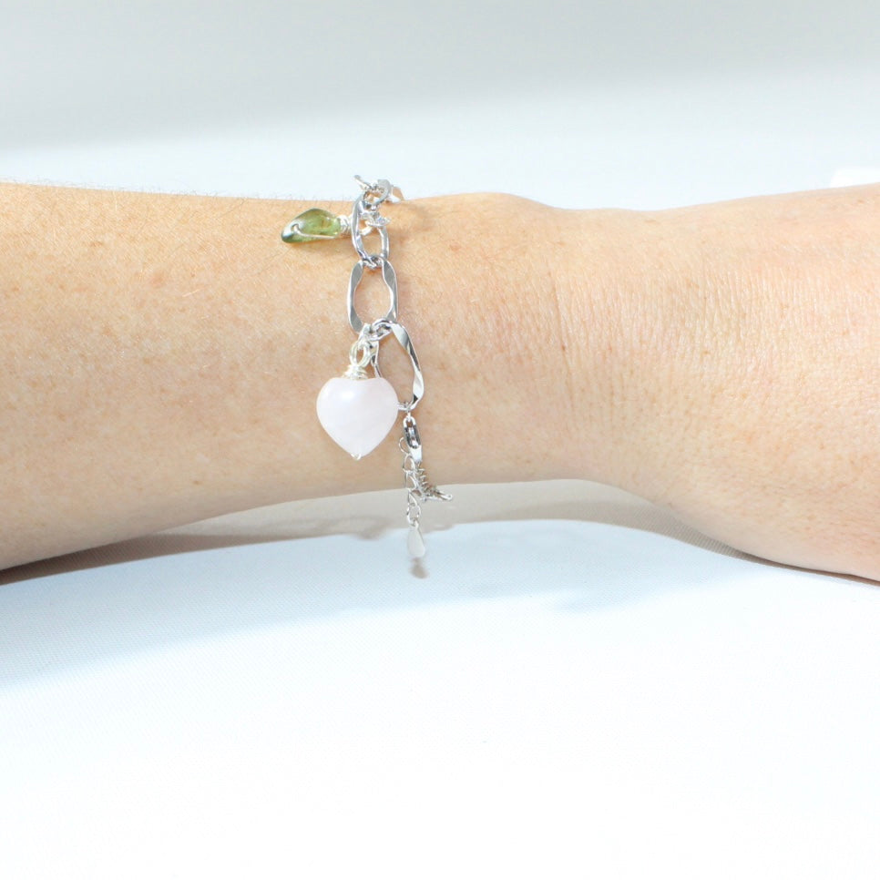 Rose Quartz & Peridot crystal sterling silver charm bracelet. Free express shipping. Shop online from ASH&STONE crystal jewellery shop Auckland NZ. 