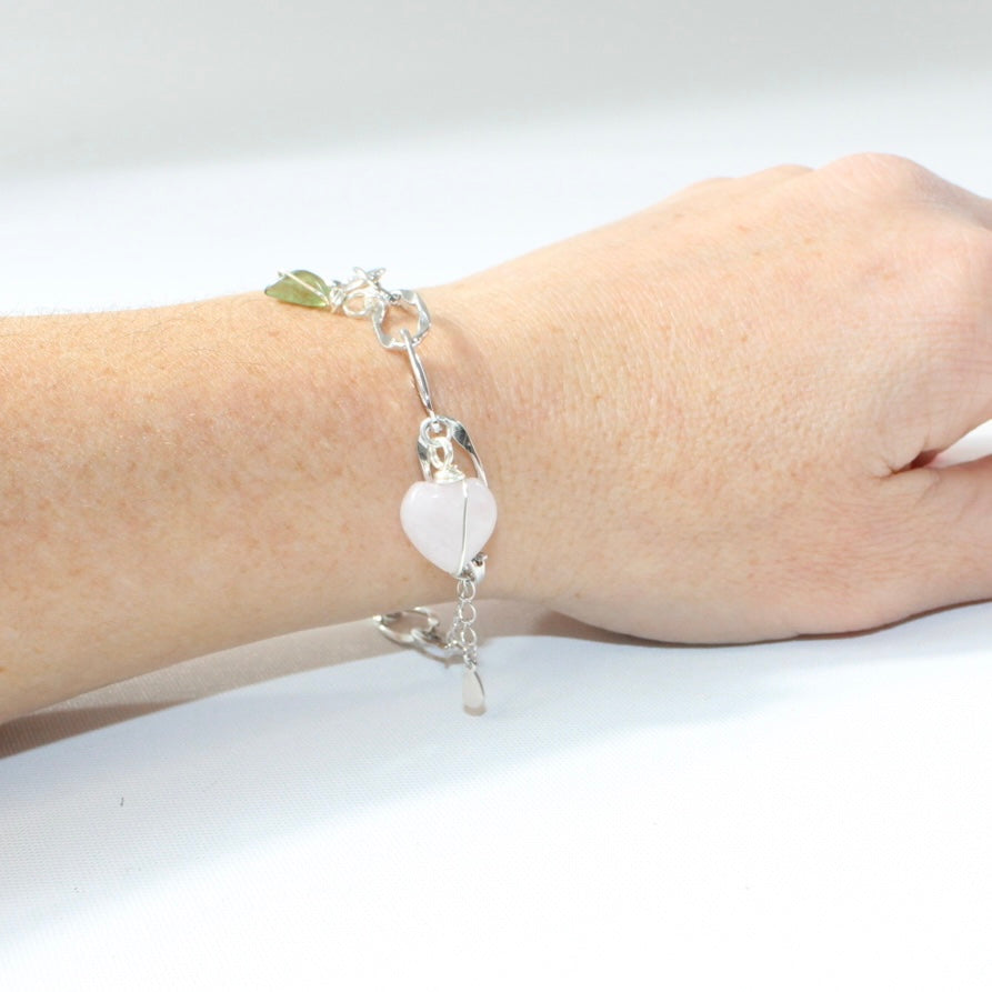 Rose Quartz & Peridot crystal sterling silver charm bracelet. Free express shipping. Shop online from ASH&STONE crystal jewellery shop Auckland NZ. 