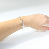 Rose Quartz & Peridot crystal sterling silver charm bracelet. Free express shipping. Shop online from ASH&STONE crystal jewellery shop Auckland NZ. 