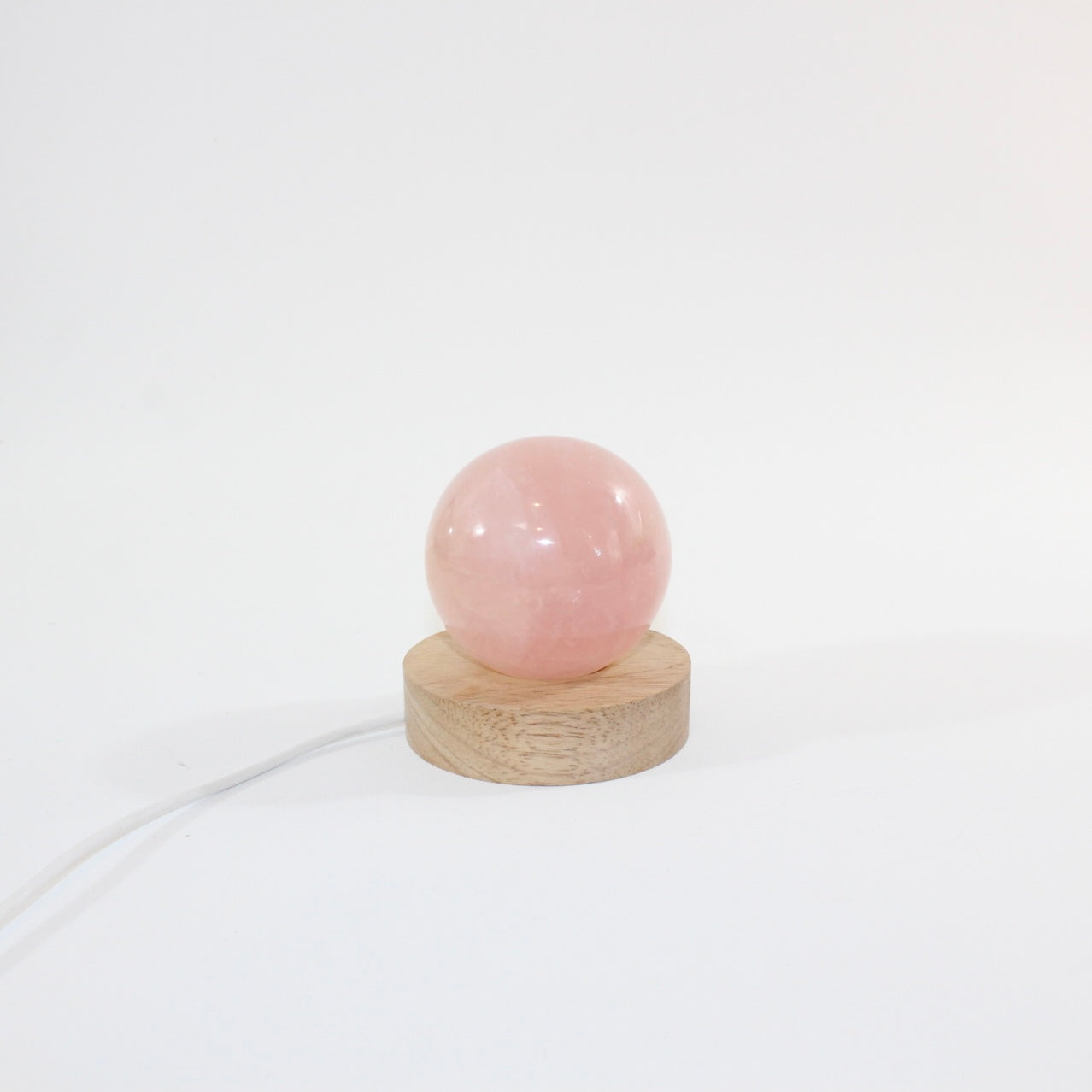 Rose Quartz Sphere Crystal Lamp | ASH & STONE. Premium crystals online. Free express shipping NZ wide 