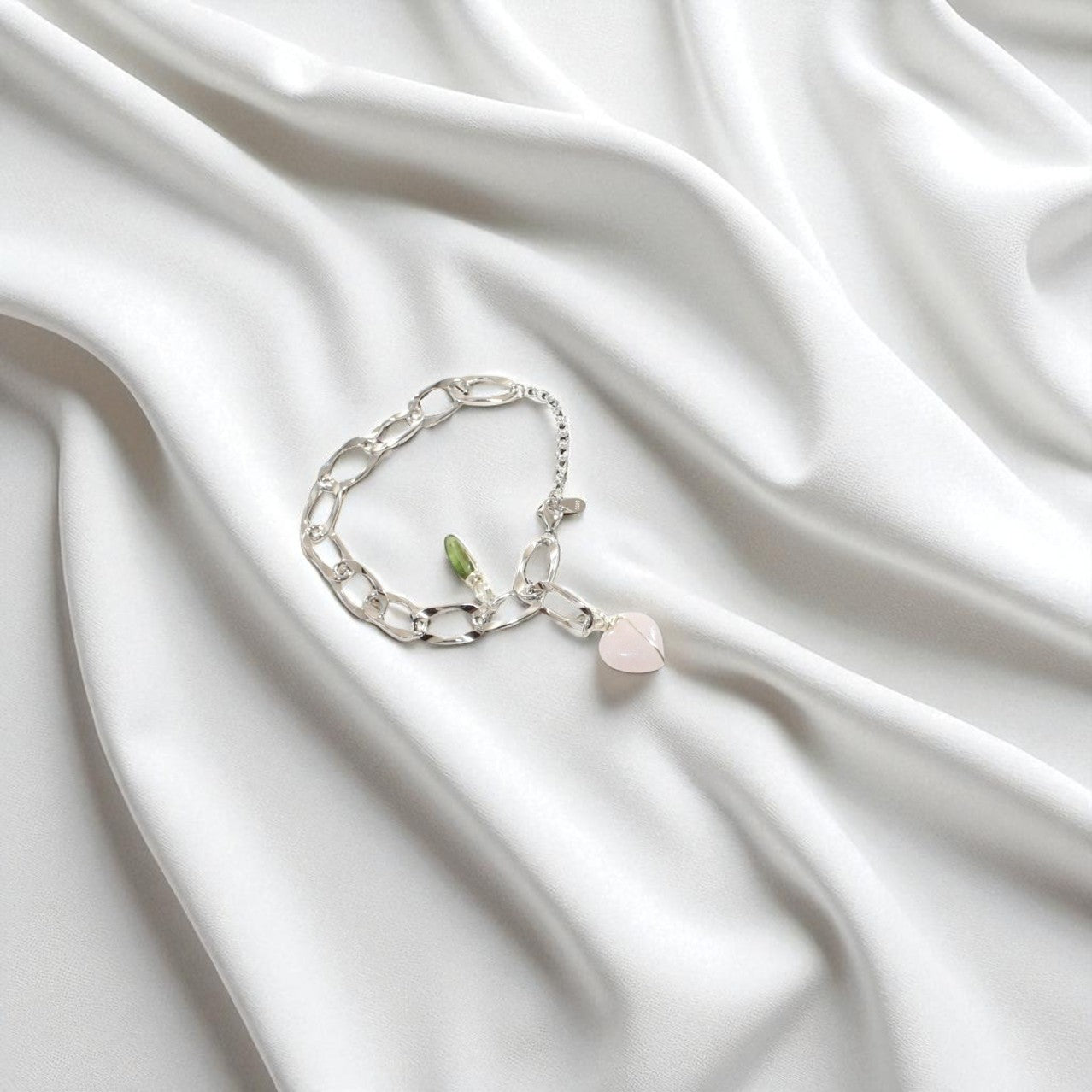 Rose Quartz & Peridot crystal sterling silver charm bracelet. Free express shipping. Shop online from ASH&STONE crystal jewellery shop Auckland NZ. 