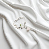 Rose Quartz & Peridot crystal sterling silver charm bracelet. Free express shipping. Shop online from ASH&STONE crystal jewellery shop Auckland NZ. 