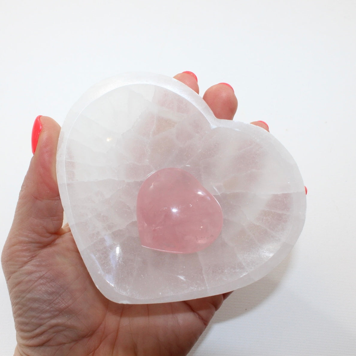  Selenite Crystal Heart Bowl matched with a Rose Quartz crystal heart mini.  Free express shipping. Shop online from ASH&STONE crystal shop Auckland NZ. AfterPay available.
