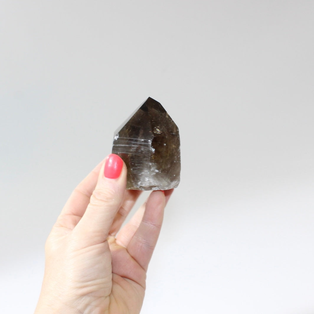 Smoky Quartz Polished Point Crystal | Free express shipping. Shop crystals online from ASH&STONE  crystal shop Auckland NZ. AfterPay available.