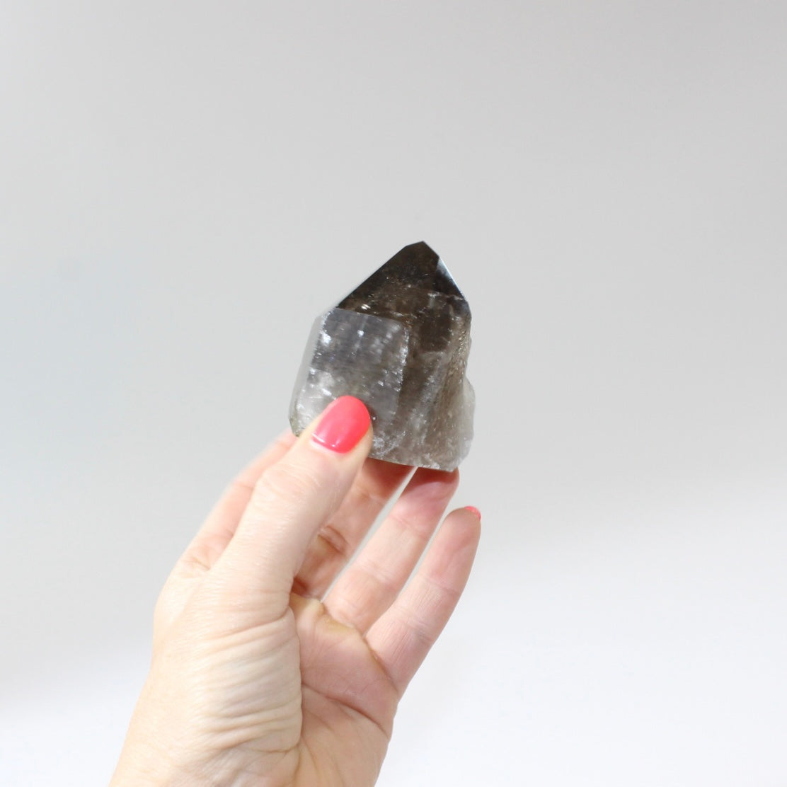 Smoky Quartz Polished Point Crystal | Free express shipping. Shop crystals online from ASH&STONE  crystal shop Auckland NZ. AfterPay available.