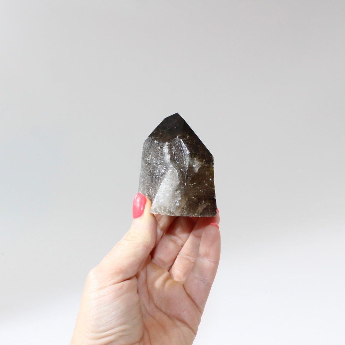 Smoky Quartz Polished Point Crystal | Free express shipping. Shop crystals online from ASH&STONE  crystal shop Auckland NZ. AfterPay available.