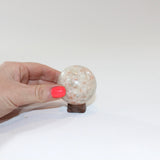 Sunstone Polished Crystal Sphere on a Small Quartz Crystal Stand. Free express shipping. Shop online from ASH&STONE crystal shop Auckland NZ. AfterPay available.