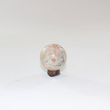 Sunstone Polished Crystal Sphere on a Small Quartz Crystal Stand. Free express shipping. Shop online from ASH&STONE crystal shop Auckland NZ. AfterPay available.