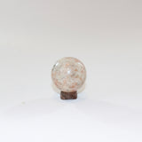 Sunstone Polished Crystal Sphere on a Small Quartz Crystal Stand. Free express shipping. Shop online from ASH&STONE crystal shop Auckland NZ. AfterPay available.