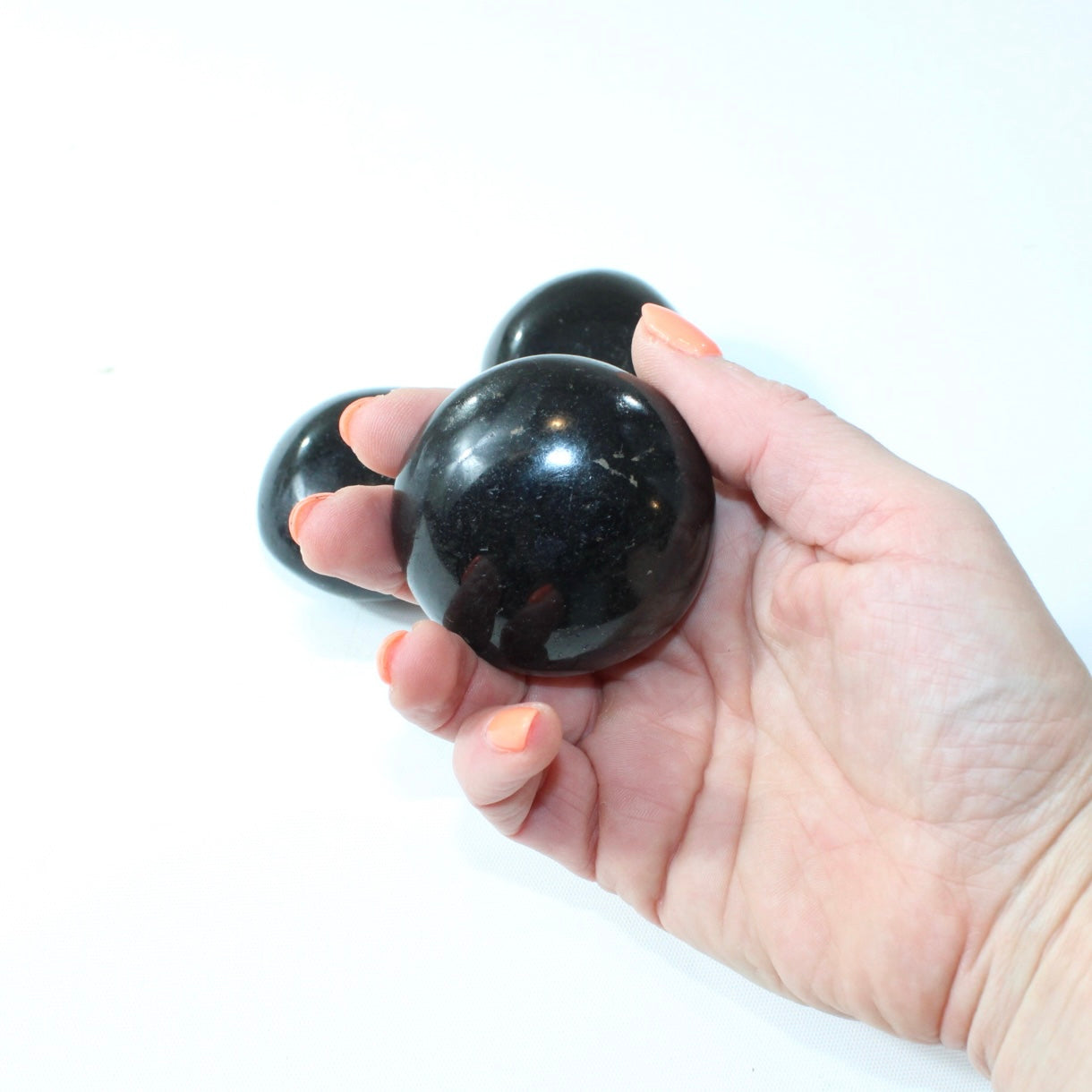 Black Tourmaline Palm Stone | Free express shipping. Buy high quality ethical crystals online at ASH&STONE crystal shop Auckland NZ. AfterPay available.