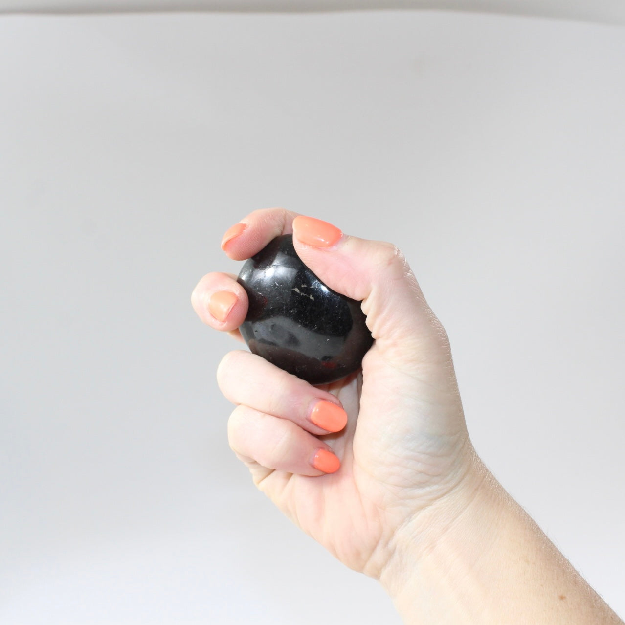 Black Tourmaline Palm Stone | Free express shipping. Buy high quality ethical crystals online at ASH&STONE crystal shop Auckland NZ. AfterPay available.