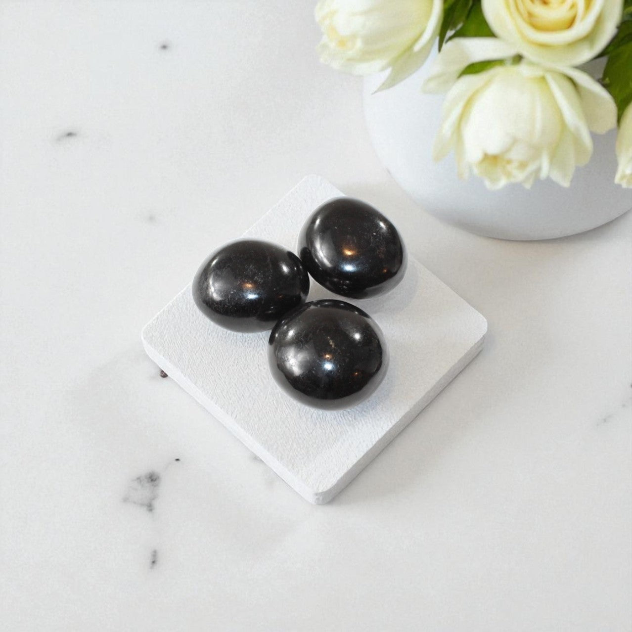 Black Tourmaline Palm Stone | Free express shipping. Buy high quality ethical crystals online at ASH&STONE crystal shop Auckland NZ. AfterPay available.