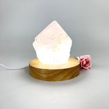 Crystal Lamps NZ: Rose quartz crystal lamp on LED wooden base