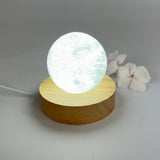 Crystal Lamps NZ: Clear quartz polished crystal sphere on LED lamp base