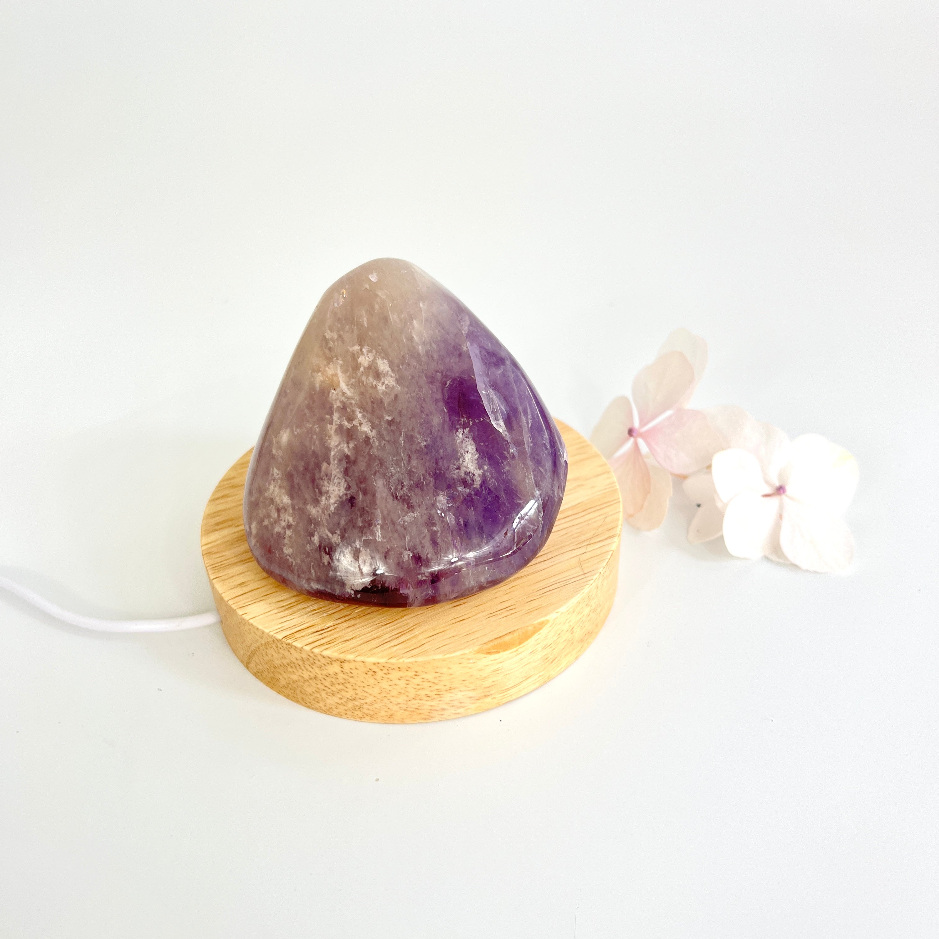 Crystal Lamps NZ: Amethyst crystal lamp on LED wooden base