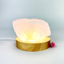 Load image into Gallery viewer, Crystals NZ: Rose quartz crystal lamp on LED wooden base
