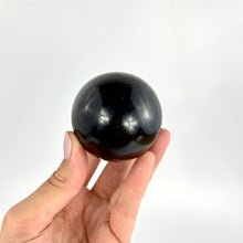 Load image into Gallery viewer, Crystals NZ: Black tourmaline crystal sphere
