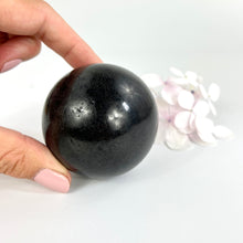 Load image into Gallery viewer, Crystals NZ: Black tourmaline crystal sphere
