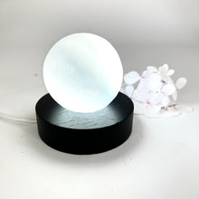 Load image into Gallery viewer, Crystals NZ: Selenite crystal sphere lamp on black LED wooden base
