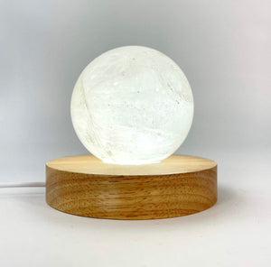 Crystal Lamps NZ: Clear quartz crystal sphere on LED lamp base