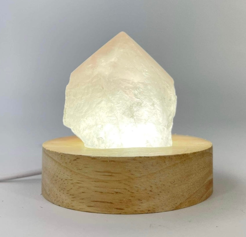 Crystal Lamps NZ: Rose quartz crystal lamp on LED wooden base