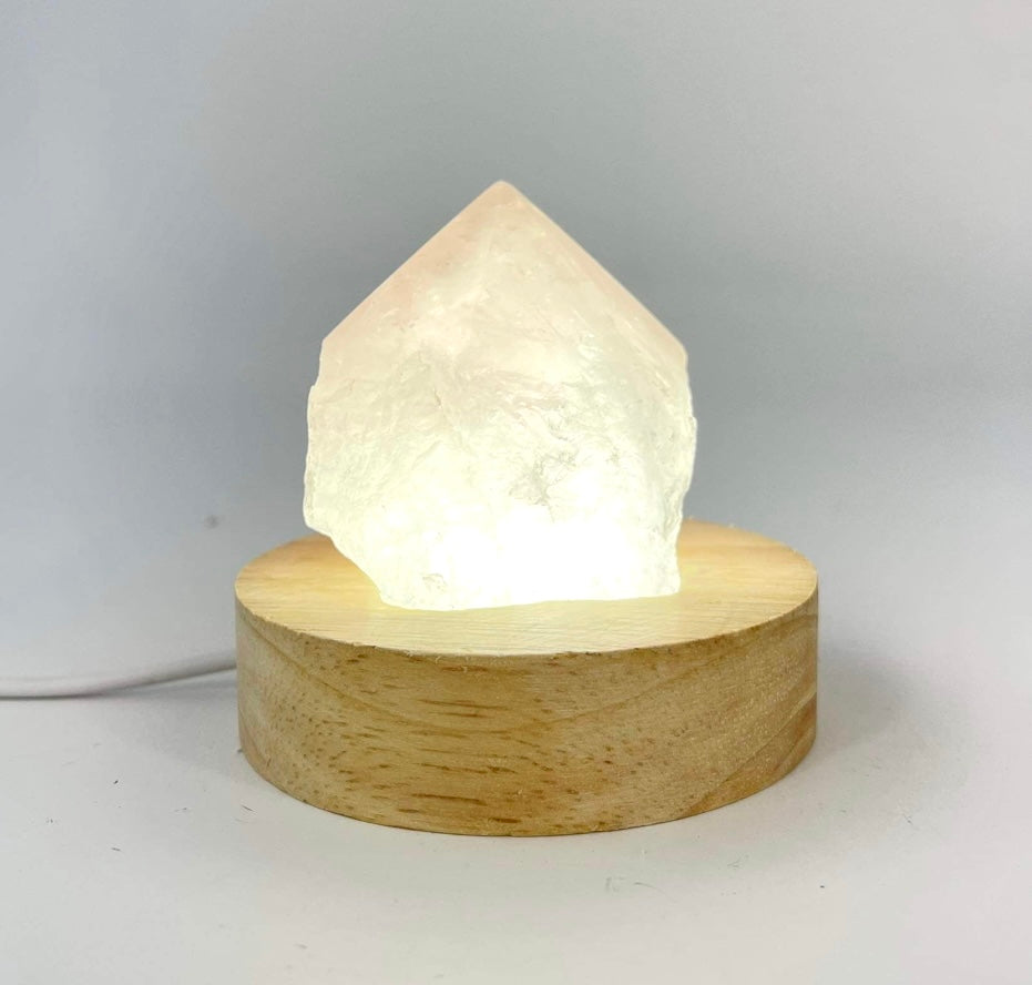 Crystal Lamps NZ: Rose quartz crystal lamp on LED wooden base