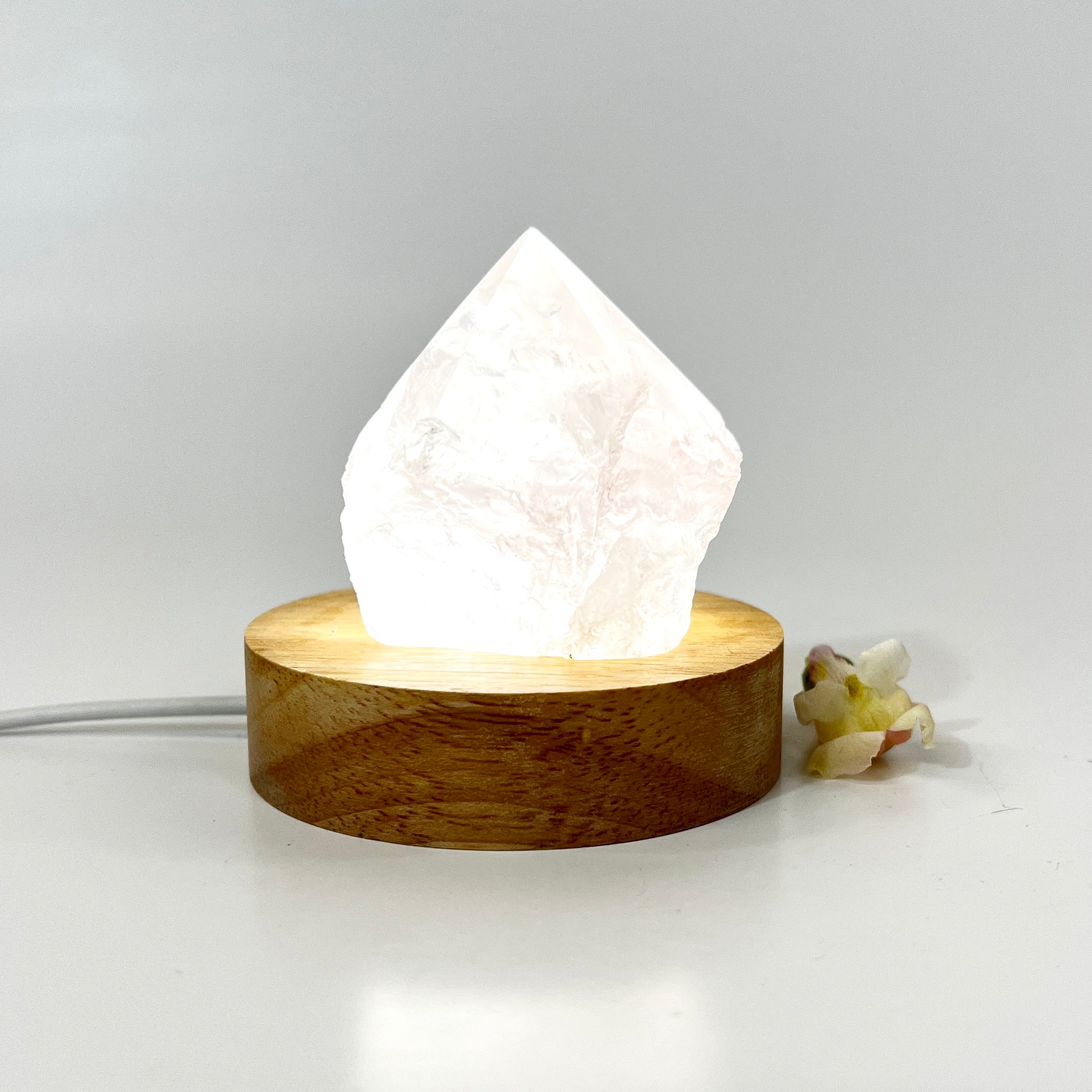 Rose quartz crystal lamp on LED wooden base: ASH&STONE Crystal Lamps NZ