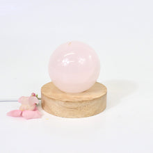 Load image into Gallery viewer, Crystal Lamps NZ: Pink mangano calcite crystal lamp on LED wooden base
