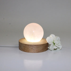 Rose quartz crystal lamp on LED wooden base | ASH&STONE Crystal Lamps 