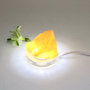Orange calcite crystal on clear perspex LED lamp base | ASH&STONE Crystals Shop 