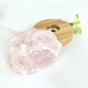 Crystals NZ: Rose quartz crystal lamp on LED wooden base