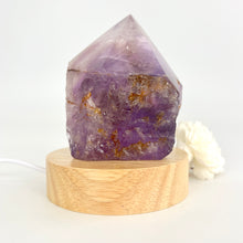 Load image into Gallery viewer, Crystal Lamps NZ: Amethyst crystal lamp on LED wooden base
