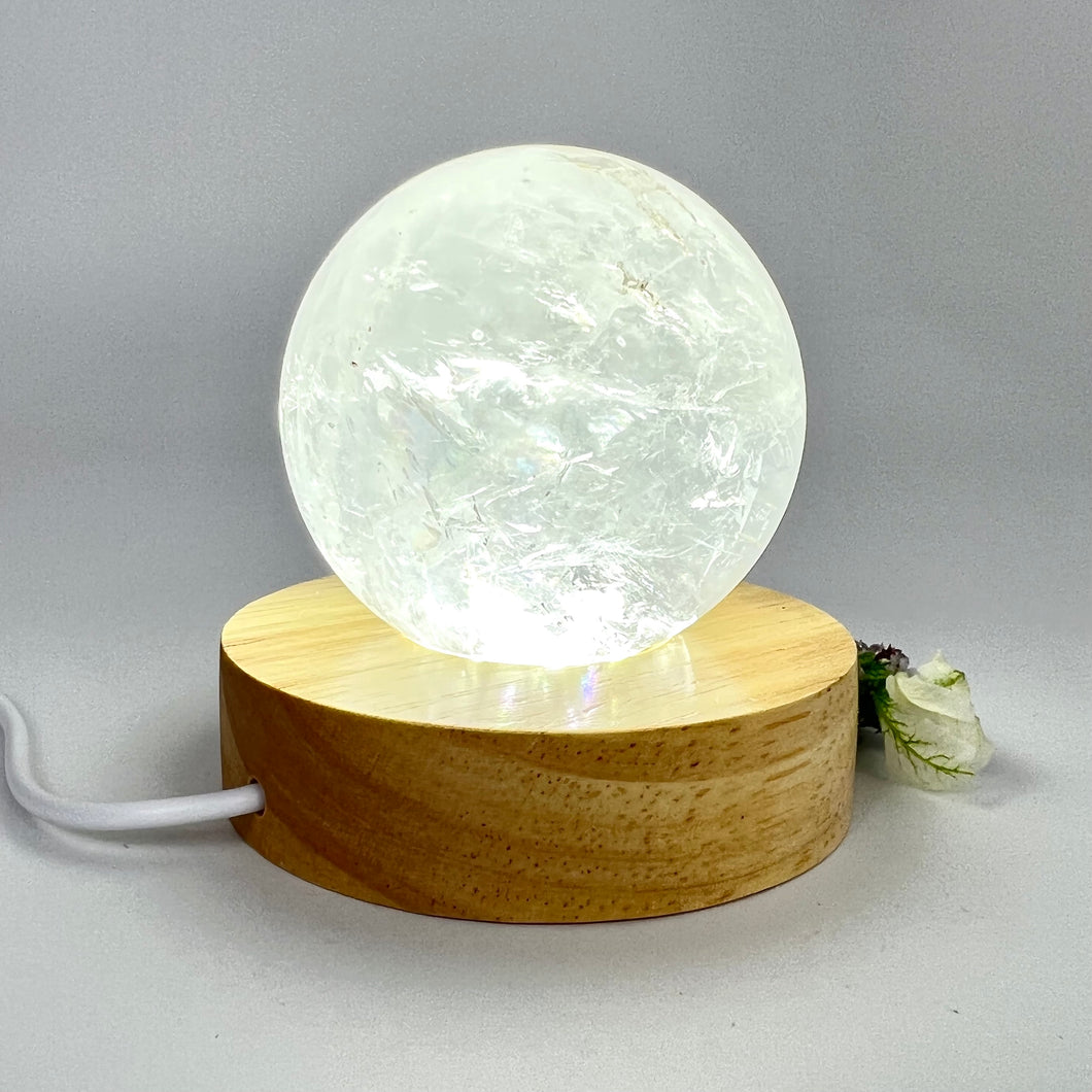 Crystal Lamps NZ: Clear quartz crystal sphere on LED lamp base