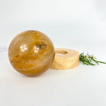 Load image into Gallery viewer, Crystal Lamps NZ: Golden healer crystal sphere on LED lamp base
