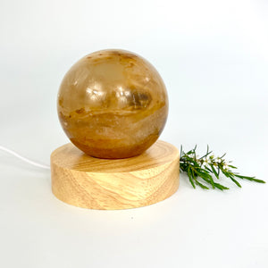 Crystal Lamps NZ: Golden healer crystal sphere on LED lamp base
