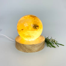 Load image into Gallery viewer, Crystal Lamps NZ: Golden healer crystal sphere on LED lamp base
