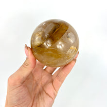 Load image into Gallery viewer, Crystal Lamps NZ: Large golden healer crystal sphere on LED lamp base
